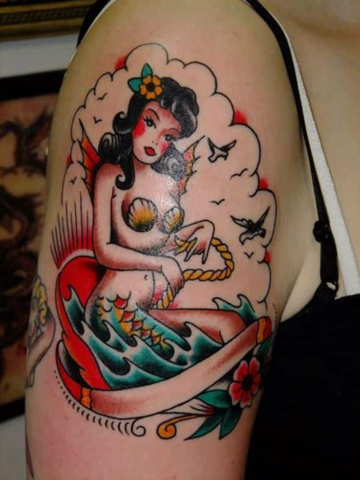 sailor jerry mermaid tattoo on arm