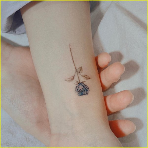 beautiful small cute flower tattoo