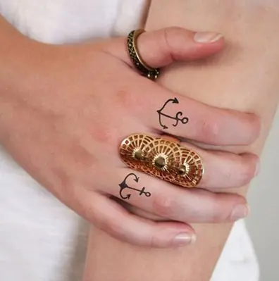 anchor finger tattoo