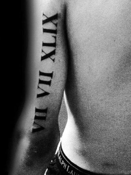 Roman Numeral Tattoos On Back Of Arm