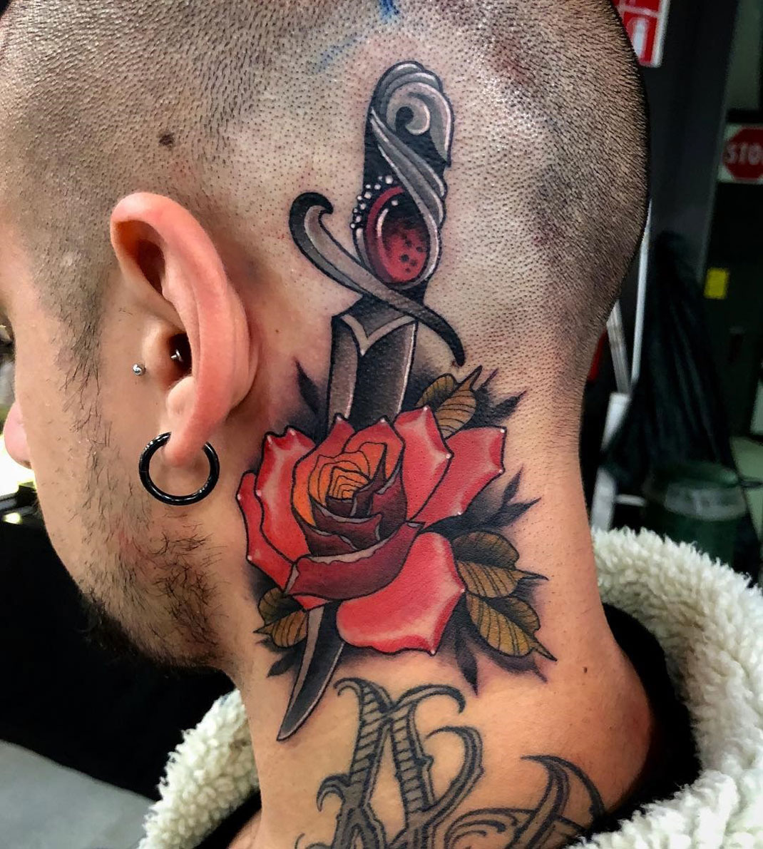Rose & Dagger neck & head tattoo