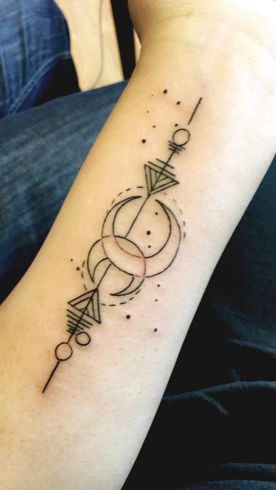 pisces geometric symbol tattoo on wrist