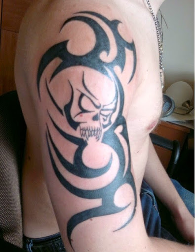 tribal skull tattoos designs on arms
