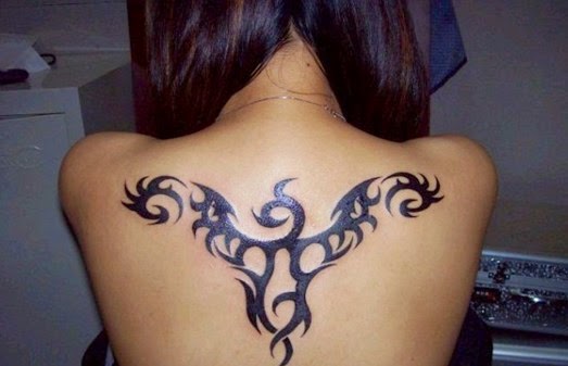 tribal tattoos on back of a girl