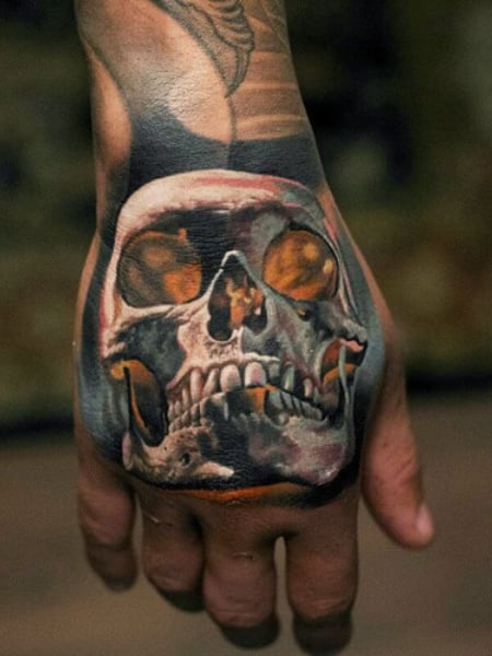 Skeleton Face Tattoo On Hand 
